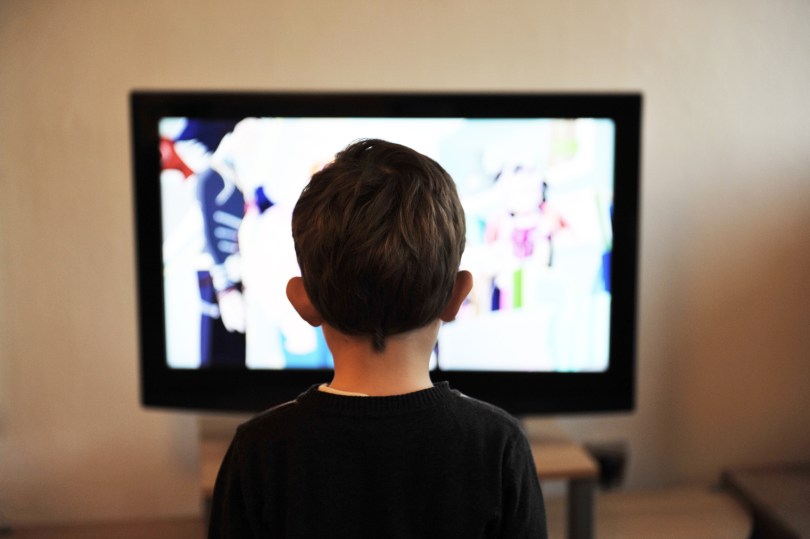 boy watching TV rather than engaging in the flow of thought