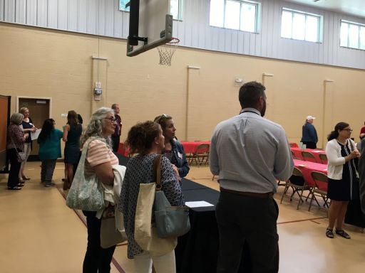 Participants get to know one another during the informal greeting time at the start of the day.